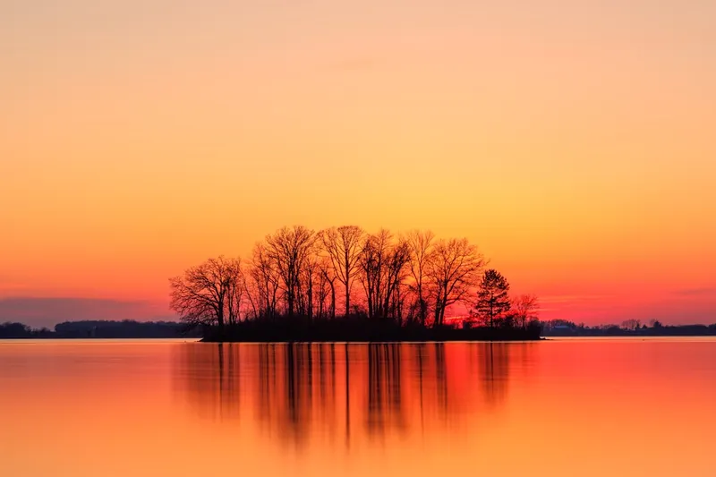 Uyuni Salt Flats landscape with endless white salt desert and blue sky