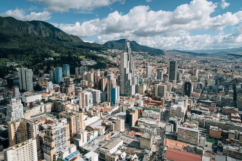 Bogota cityscape with modern office buildings and the Andes mountains in the background
